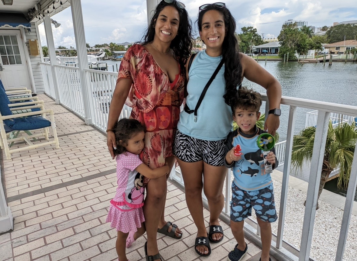 Sandy with family by the water