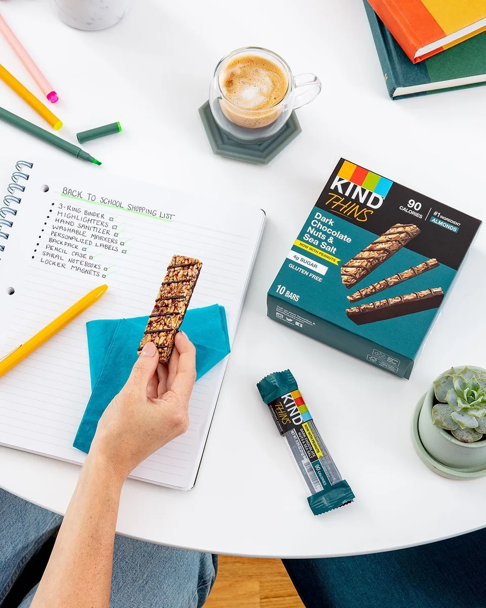 Previous KIND visual identity — KIND Thins back-to-school tabletop